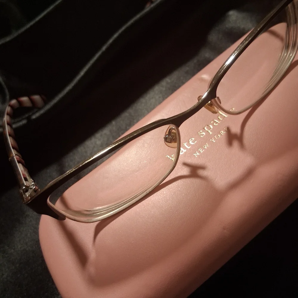 Kate Spade Rectangle Frames Tortise Shell With Pink and Black Striped Frames.